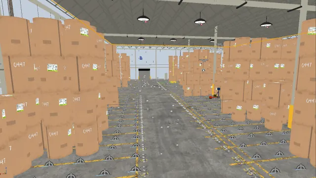 Low camera view down a warehouse aisle between stacks of brown paper rolls